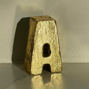 Gilding Gold Concrete capital letters